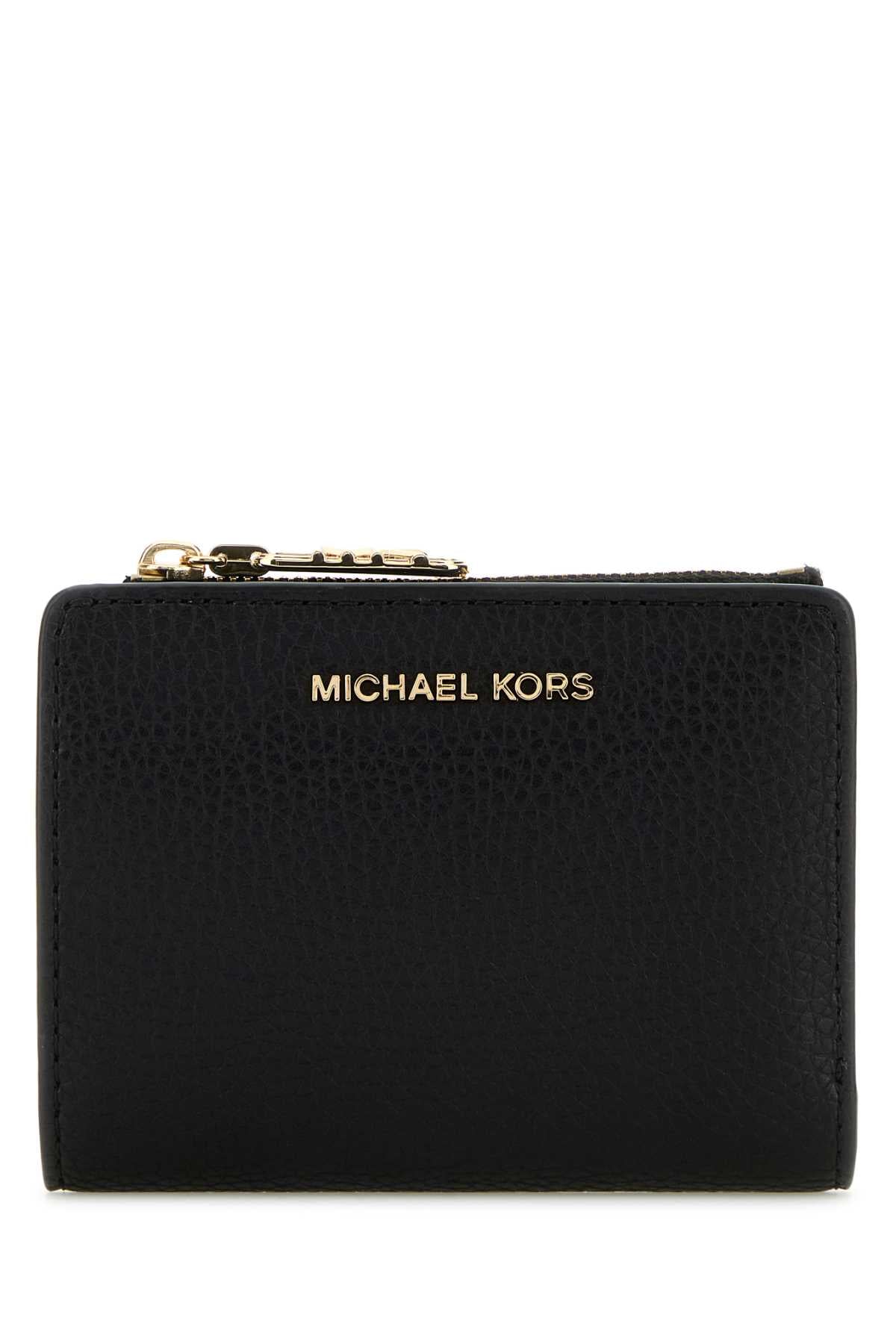 3032_SOLID_FLOATER_PEBBLE_LEATHER_32S4G8ED7L_BLACK_Image_1