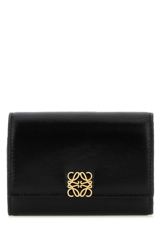ANAGRAM_PUFFER_SMALL_VERTICAL_C821S33X06_BLACK_Image_1