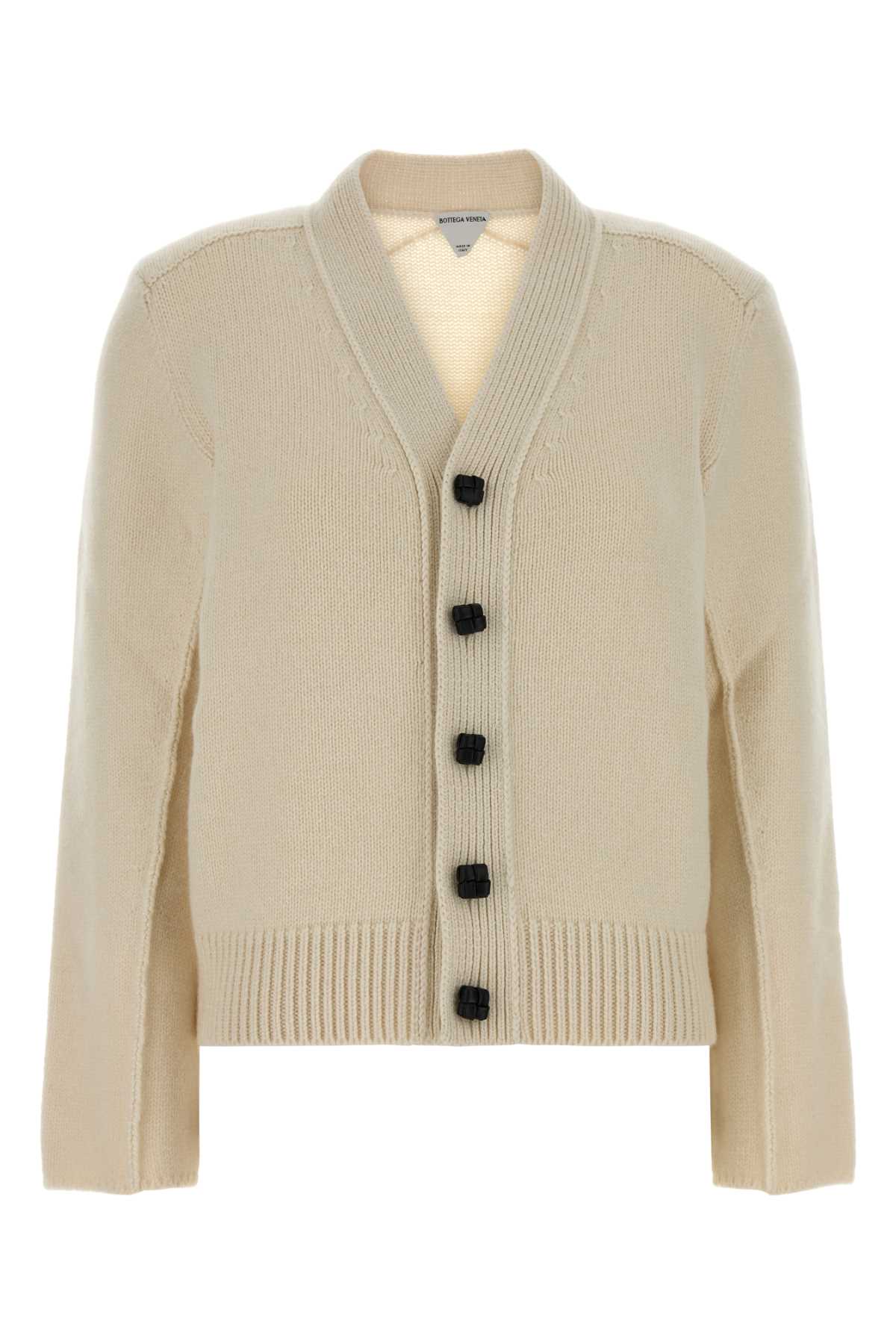 CARDIGAN_CON_BOTTONI_PELLE_INTRECCIO_A002SMV6N20_9107_Image_1