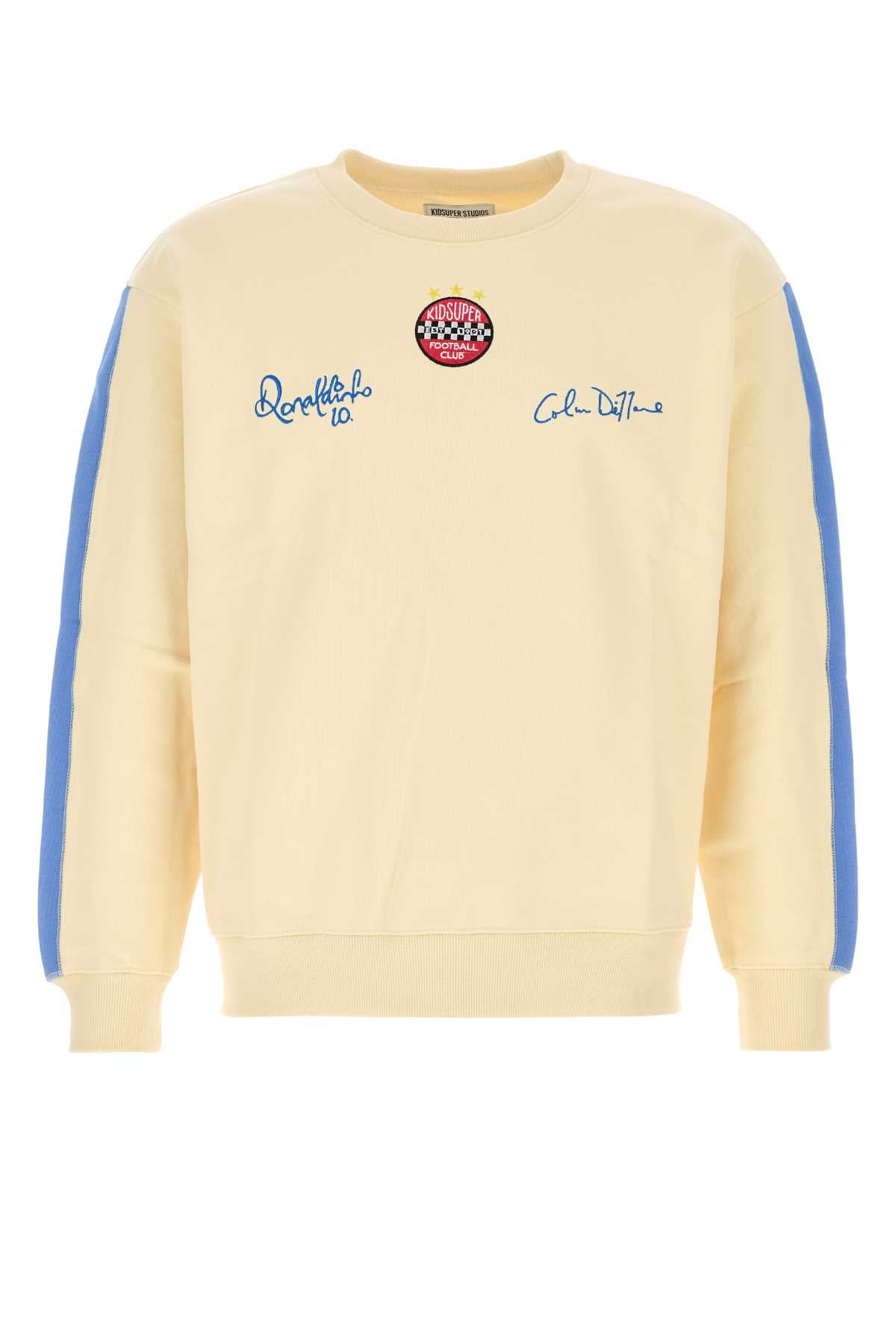 KIDSUPER_X_RONALDINHO_CREWNECK_SWEATSHIRT_AW24FLCTP01_CREAM_Image_1