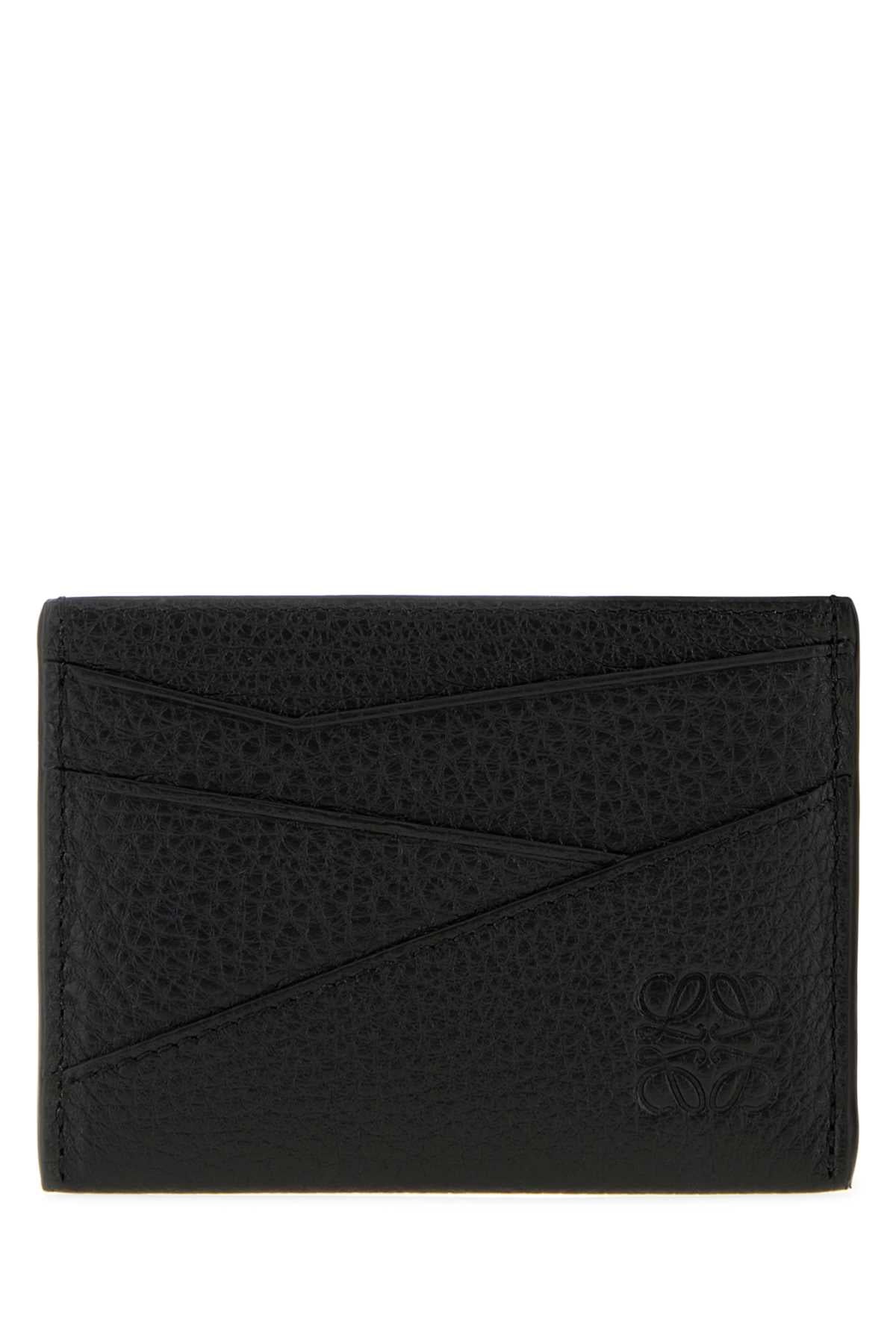 PUZZLE_EDGE_PLAIN_CARDHOLDER_C510Q77X14_BLACK_Image_1