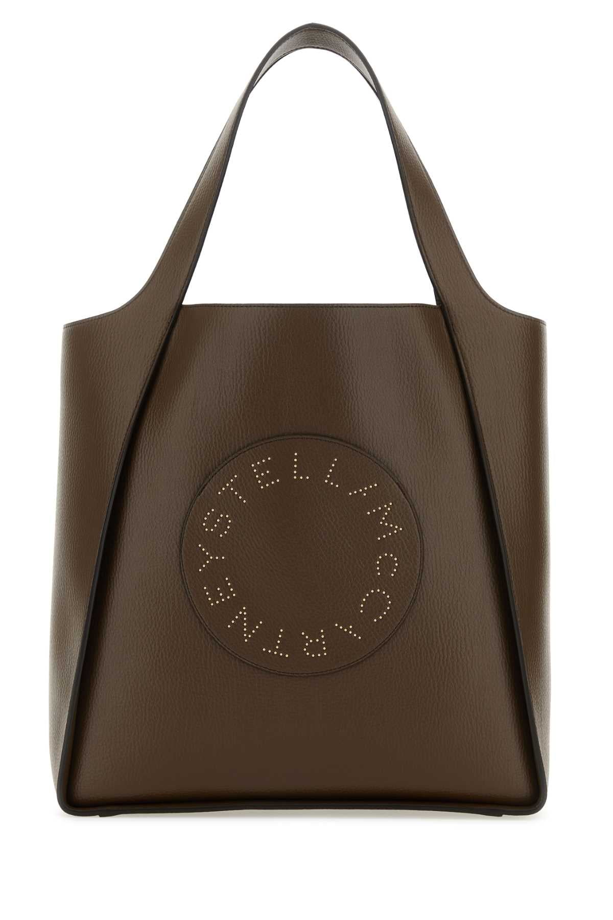 TOTE_EMBOSSED_GRAINY_MAT_WSTUDDED_LOGO_7B0031WP0234_2000_Image_1